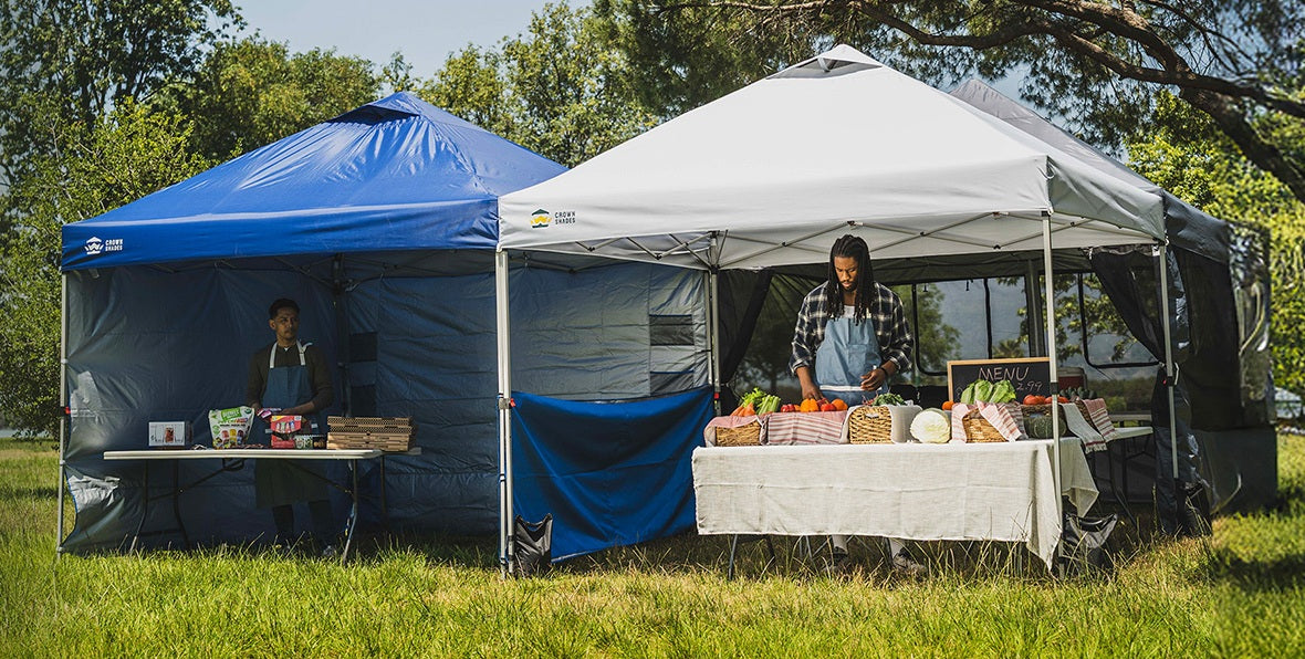 Farmers market canopy setup by Crown Shades with produce on display