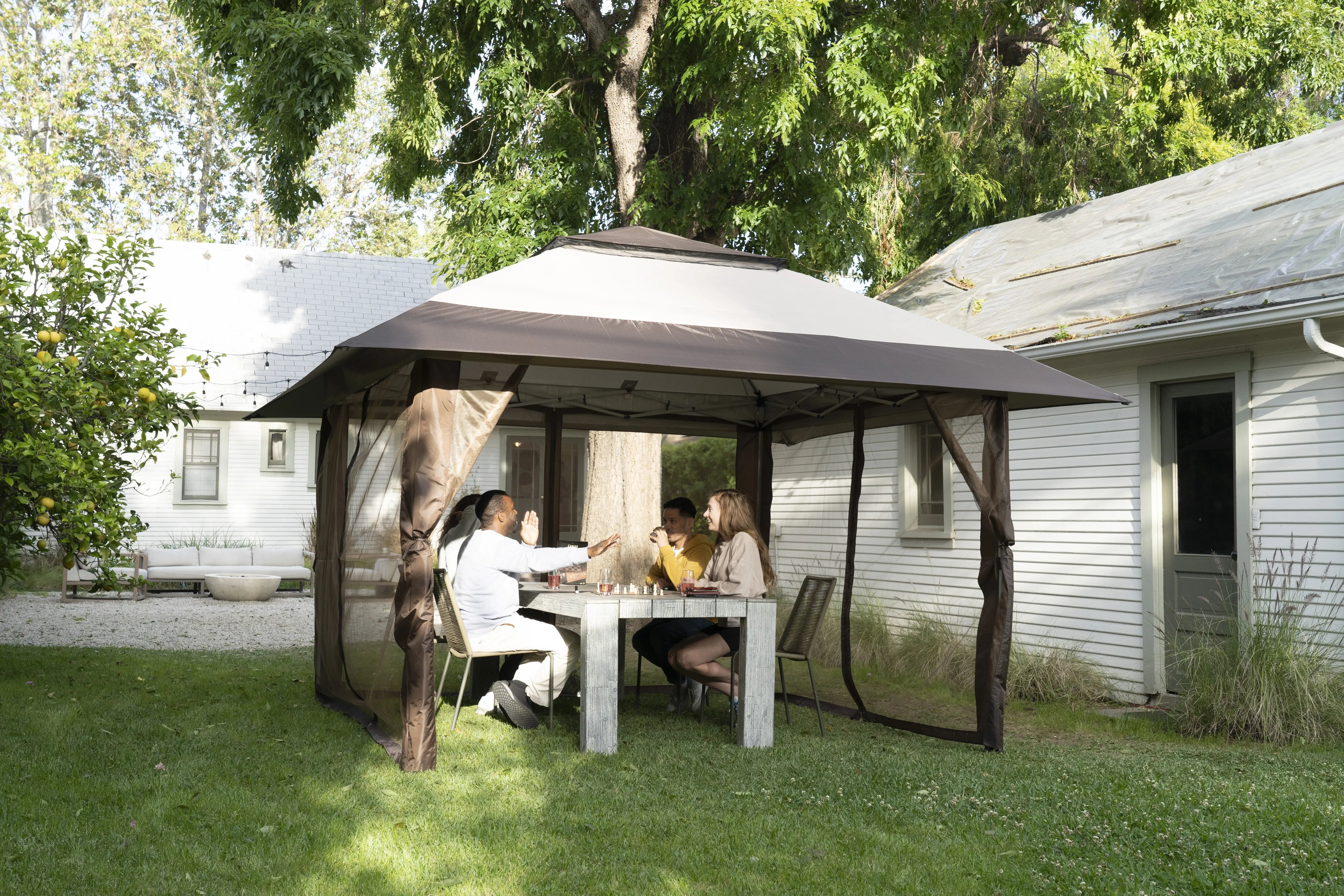 Make Every Backyard BBQ Better with Crown Shades® Canopy Tents